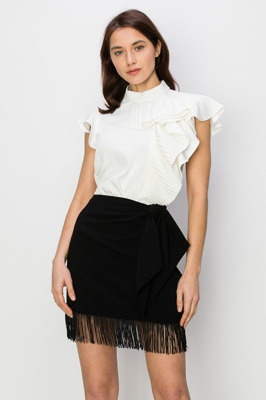 BLUSA CON VUELOS